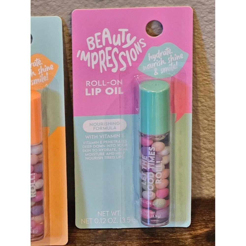 NWT Beauty Impressions Roll-On Lip Oil Bundle